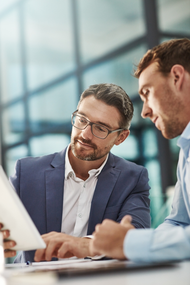 businessmenmeetingandfinancediscussionwithtabletstockmarketresearch