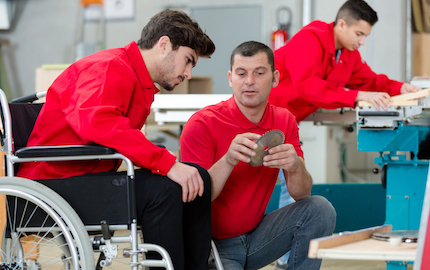 disabledworkerinwheelchairinacarpentersworkshop